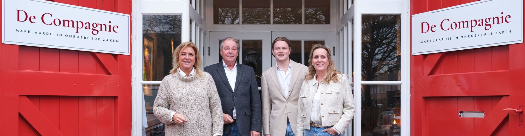 The De Compagnie team in front of the red stable doors of our office in Loenen aan de Vecht